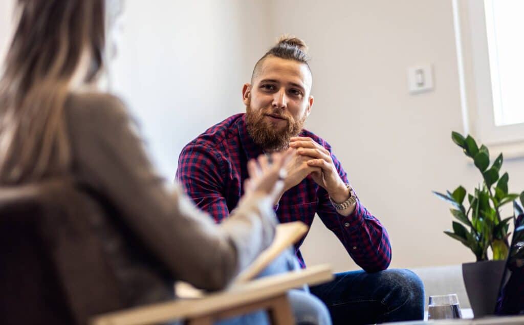 One-on-one session during cognitive behavioral therapy in San Diego.