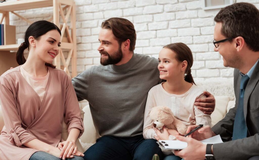 Family sitting together during family therapy.