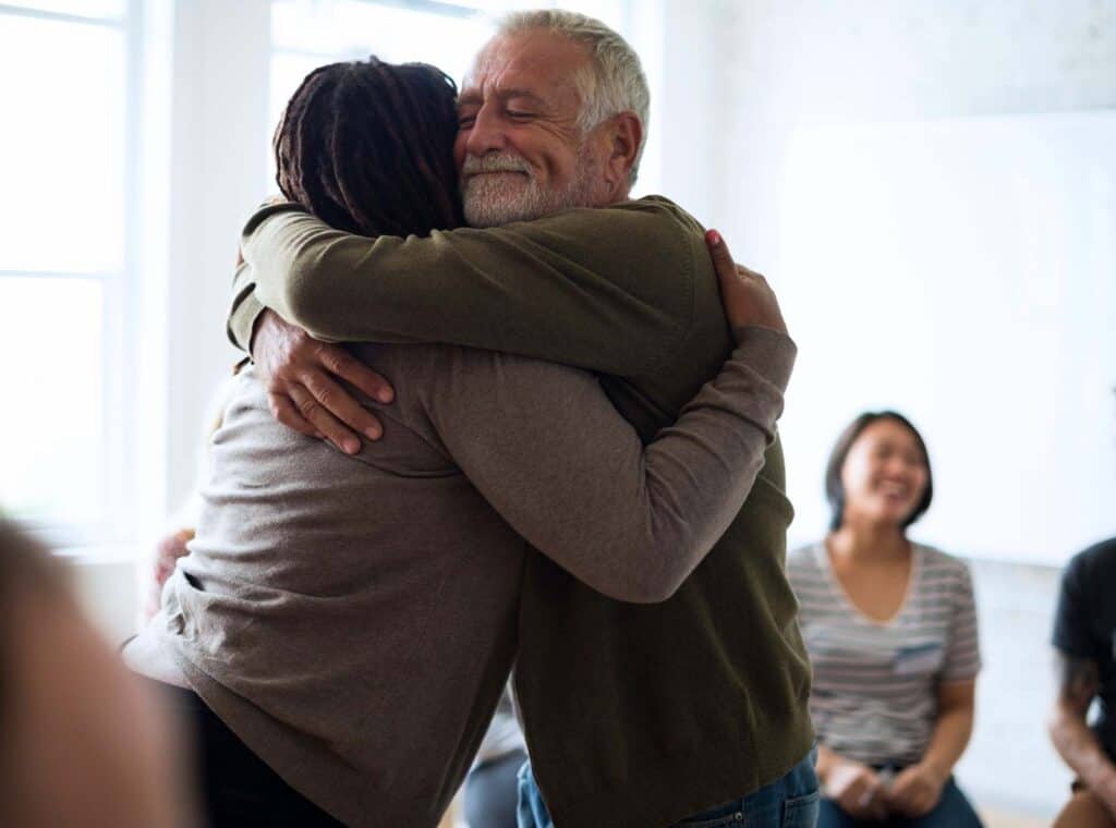 Man reconnecting with a loved one during heroin addiction treatment in San Diego, CA.