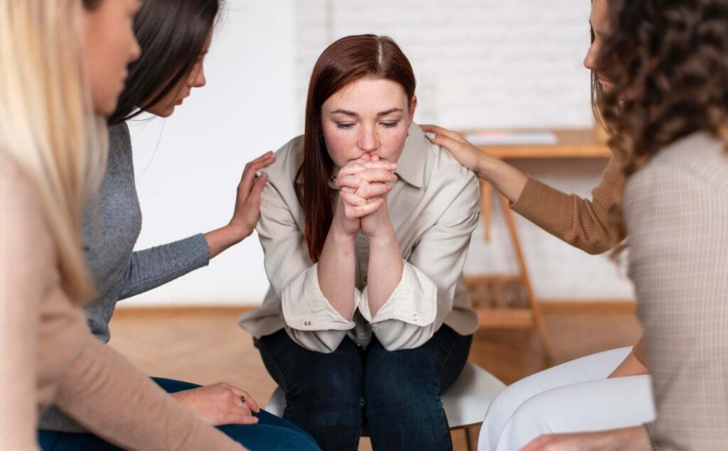 People connecting during a residential treatment group session.