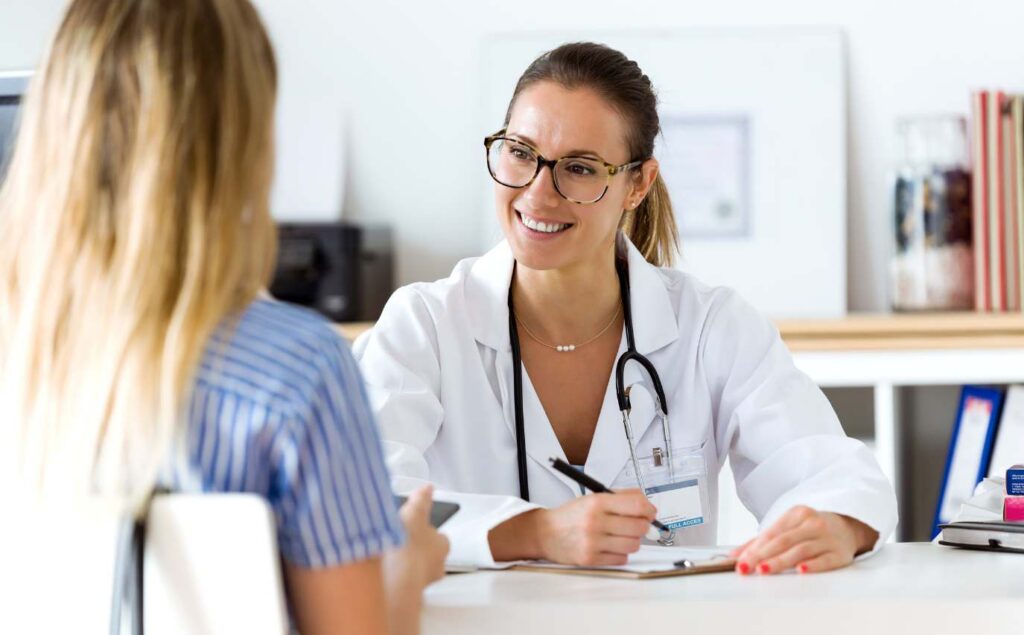 Doctor speaking with a client at a San Diego detox center.