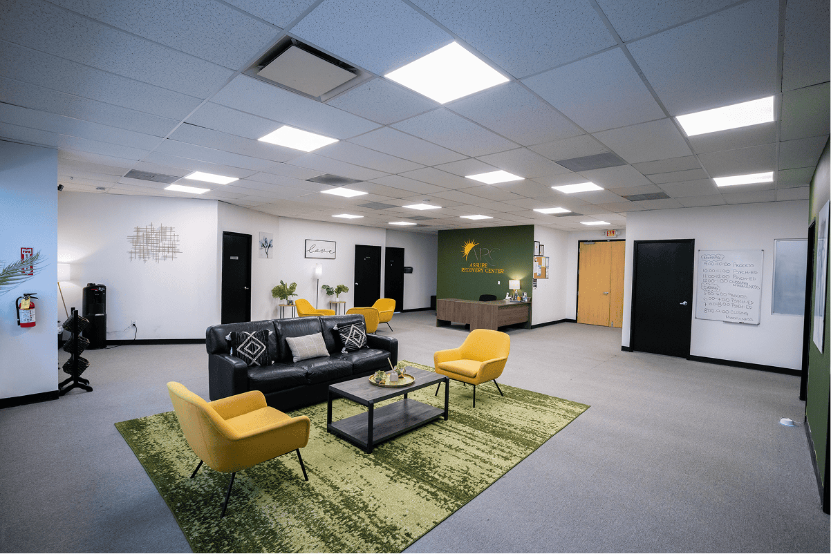 Bright, welcoming counseling office with comfortable seating and large windows.