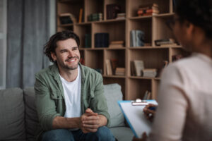 Man consulting with a psychologist during treatment at a men's rehab in San Diego.