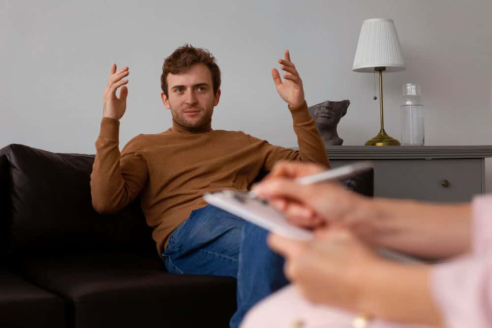 Man participating in therapy to address kratom dependence and the side effects of kratom withdrawal.